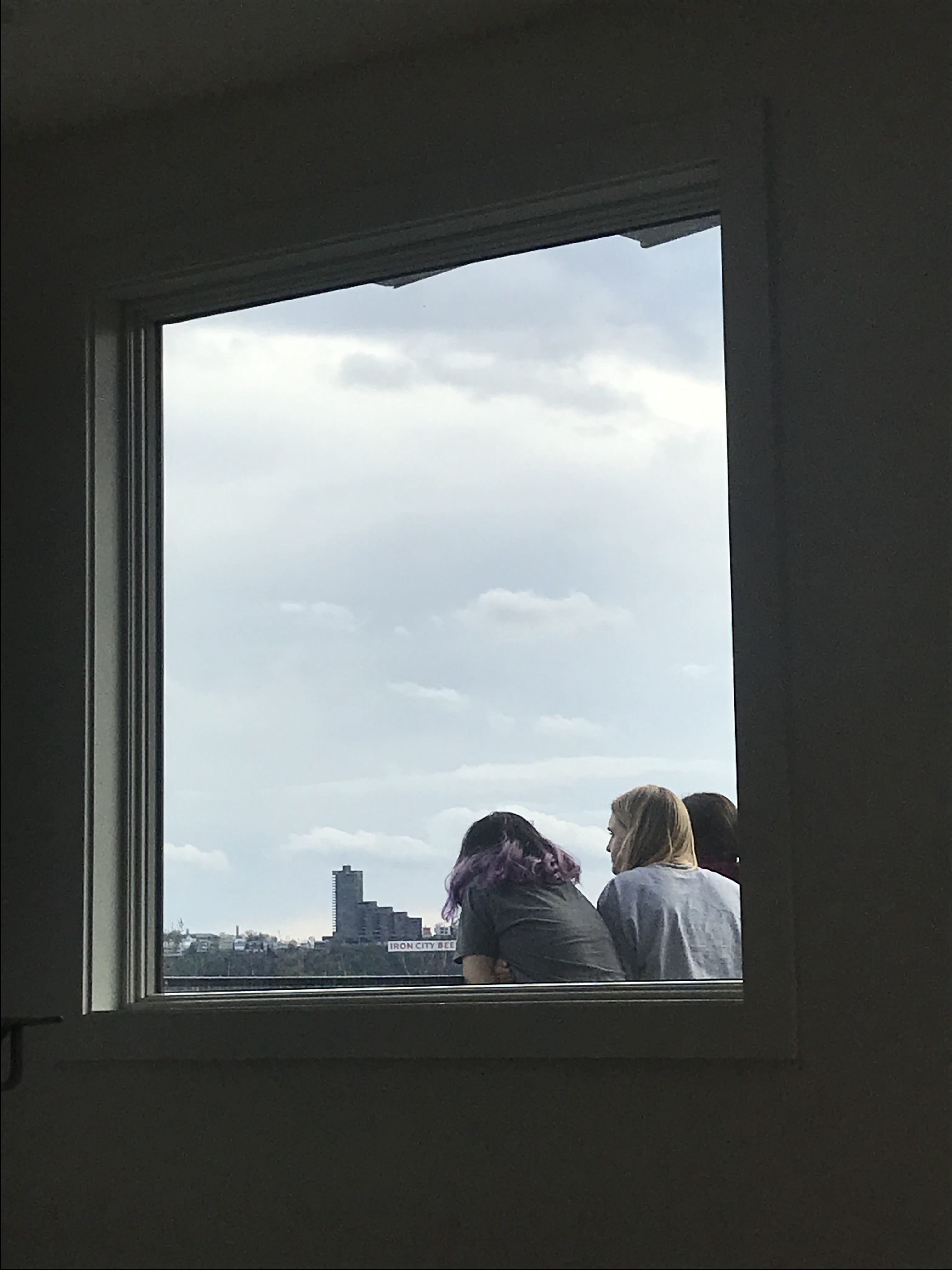 Teenagers in Window